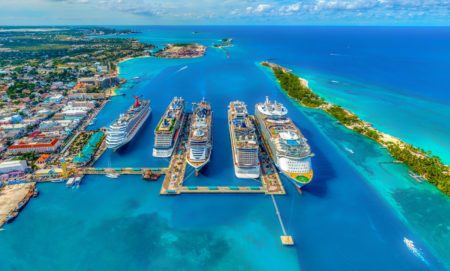 aerial photography of white and blue celebrity cruise ships during daytime